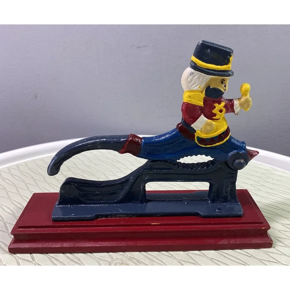 Vintage Cast Iron Nut Cracker Painted‎ on Mounted Wood Base Christmas 6x7.5x2